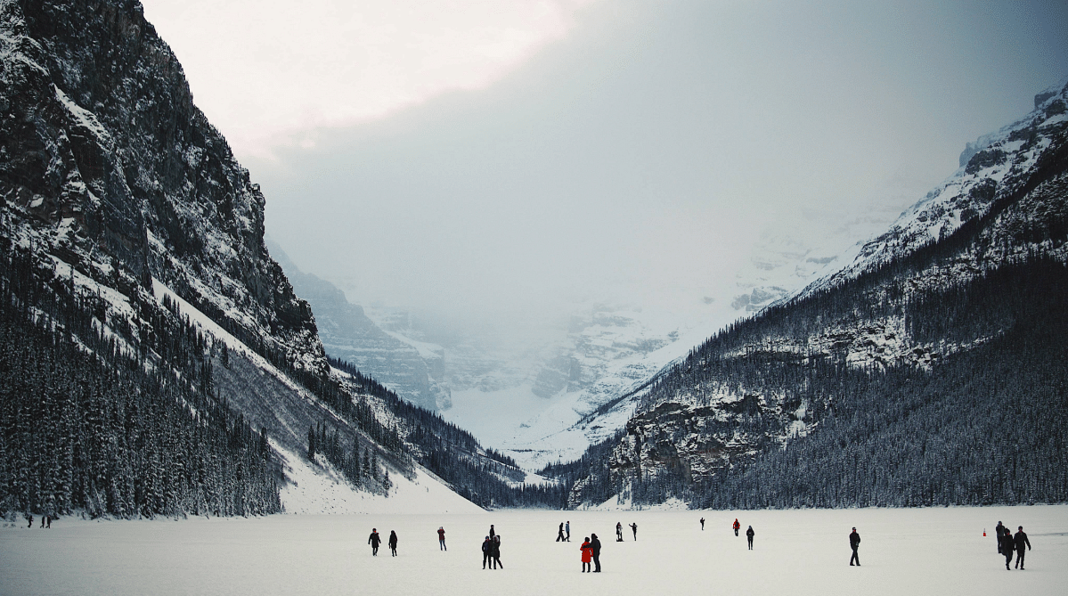 People ice skating on Lake Louise, Alberta, Canada