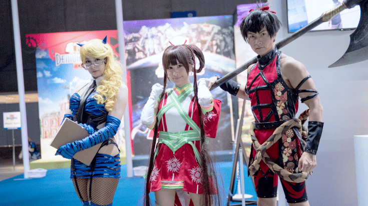 Cosplayers at Tokyo Game Show 2025 dressed as anime and video game characters in colourful costumes. Highlighting the creativity, fan culture, and photo opportunities at the Tokyo game expo.