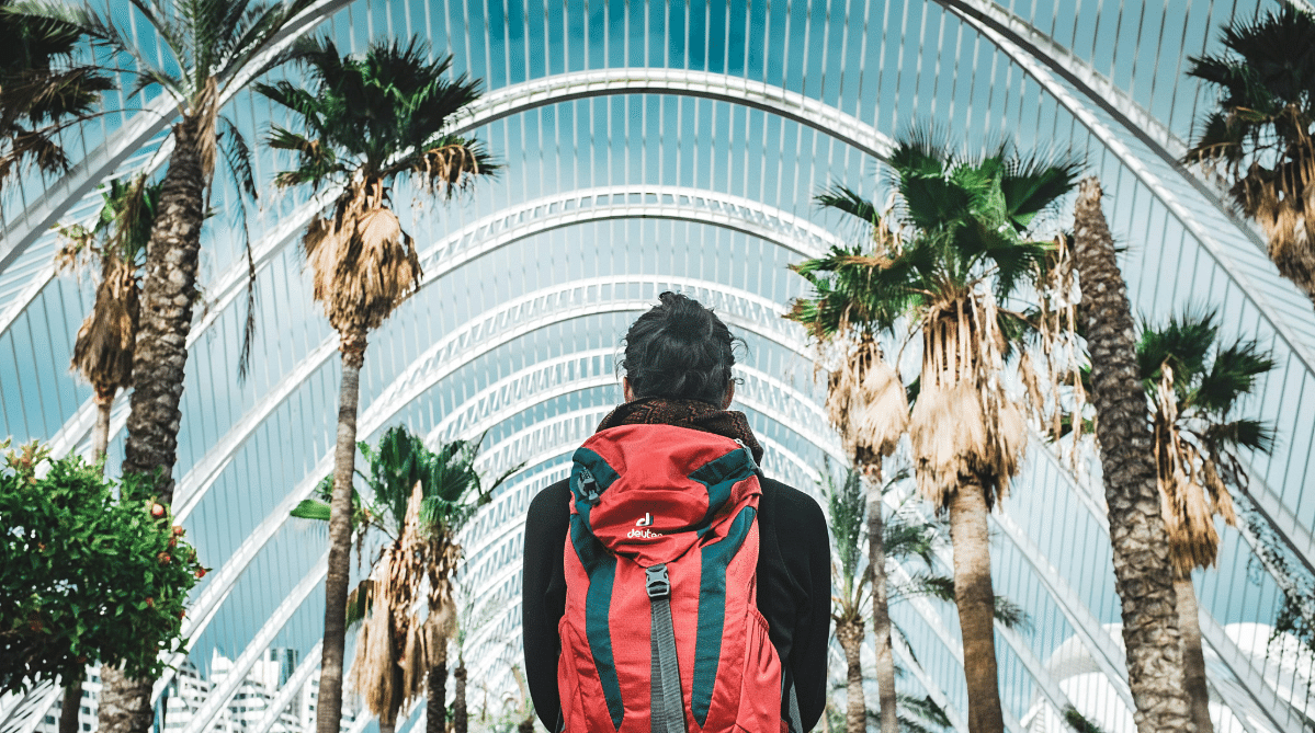 Traveler wearing a backpack