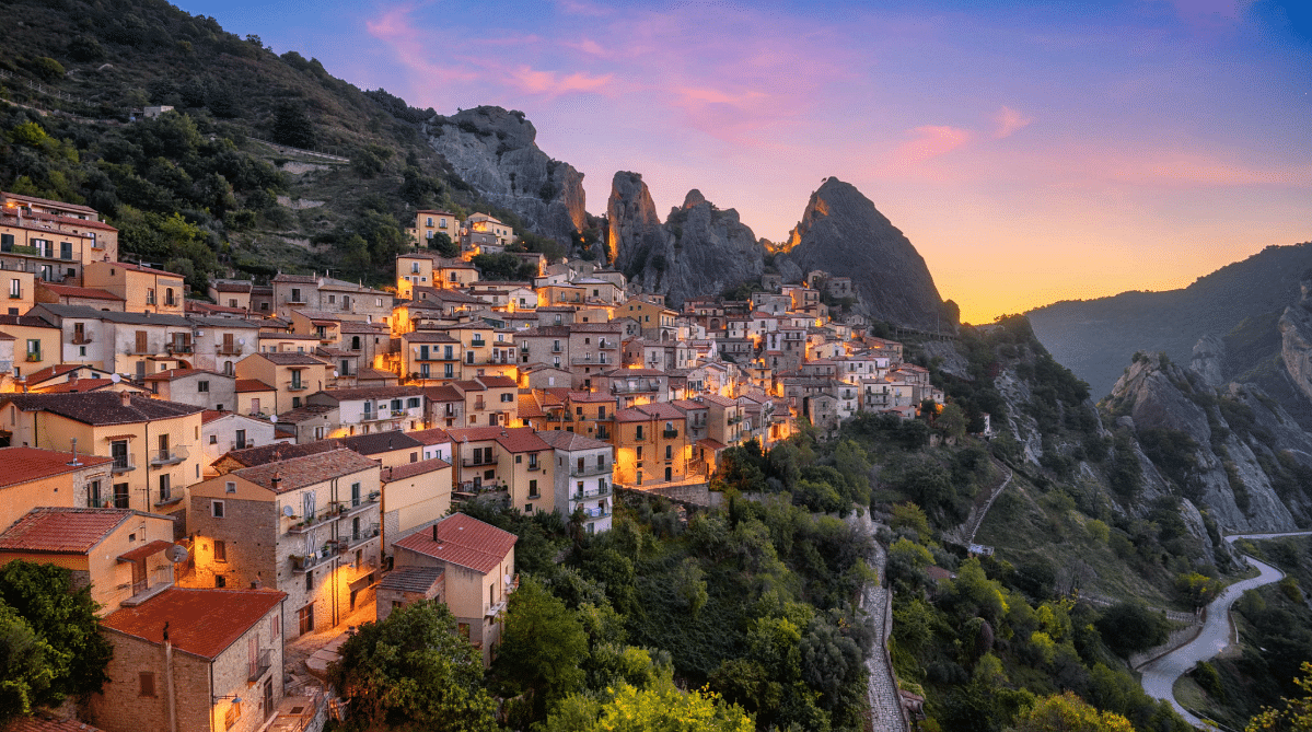 Houses along a cliff face in Castelmezzano, Italy