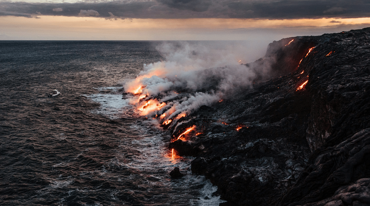 Lava flowing into the ocean in Volcanoes National Park, Hawaii