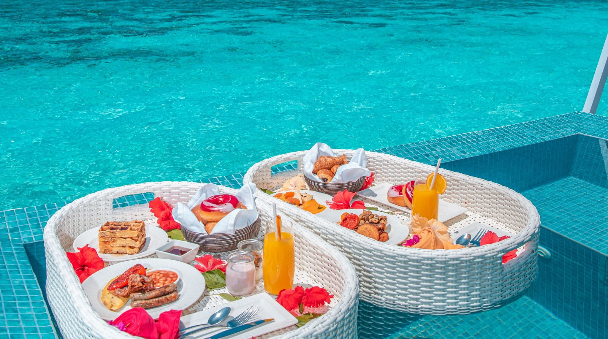 pool basket with food in maldives