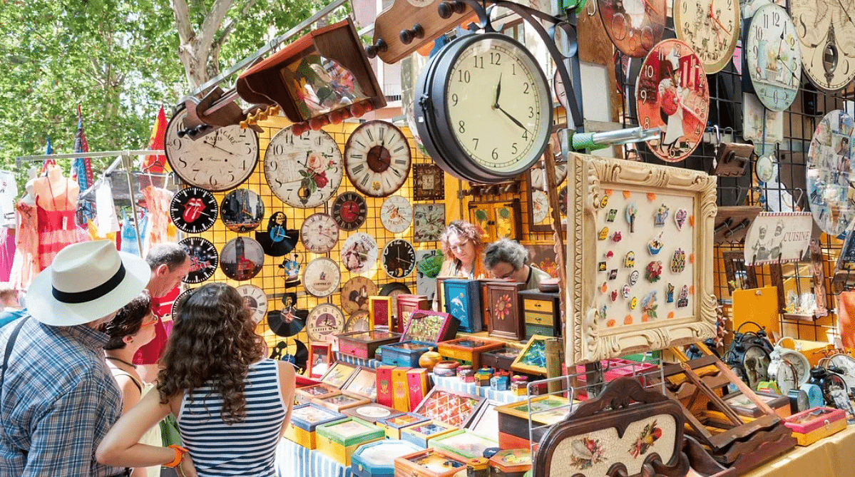 Stall selling clocks in El Rastro market, Madrid