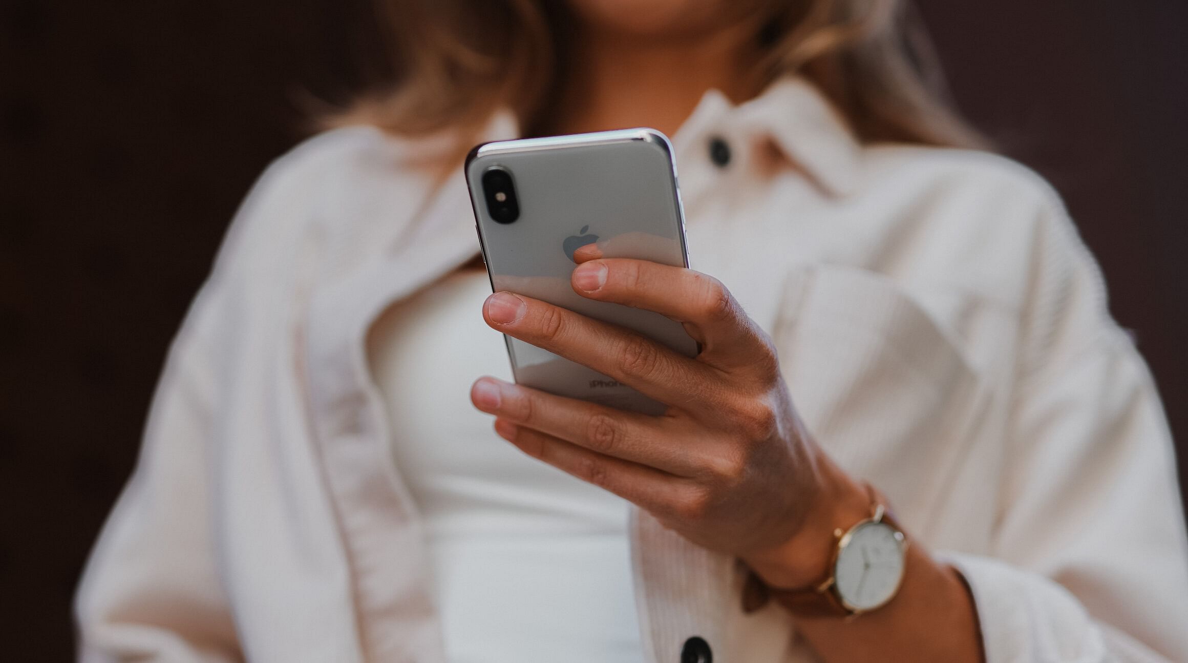 girl looking at smartphone