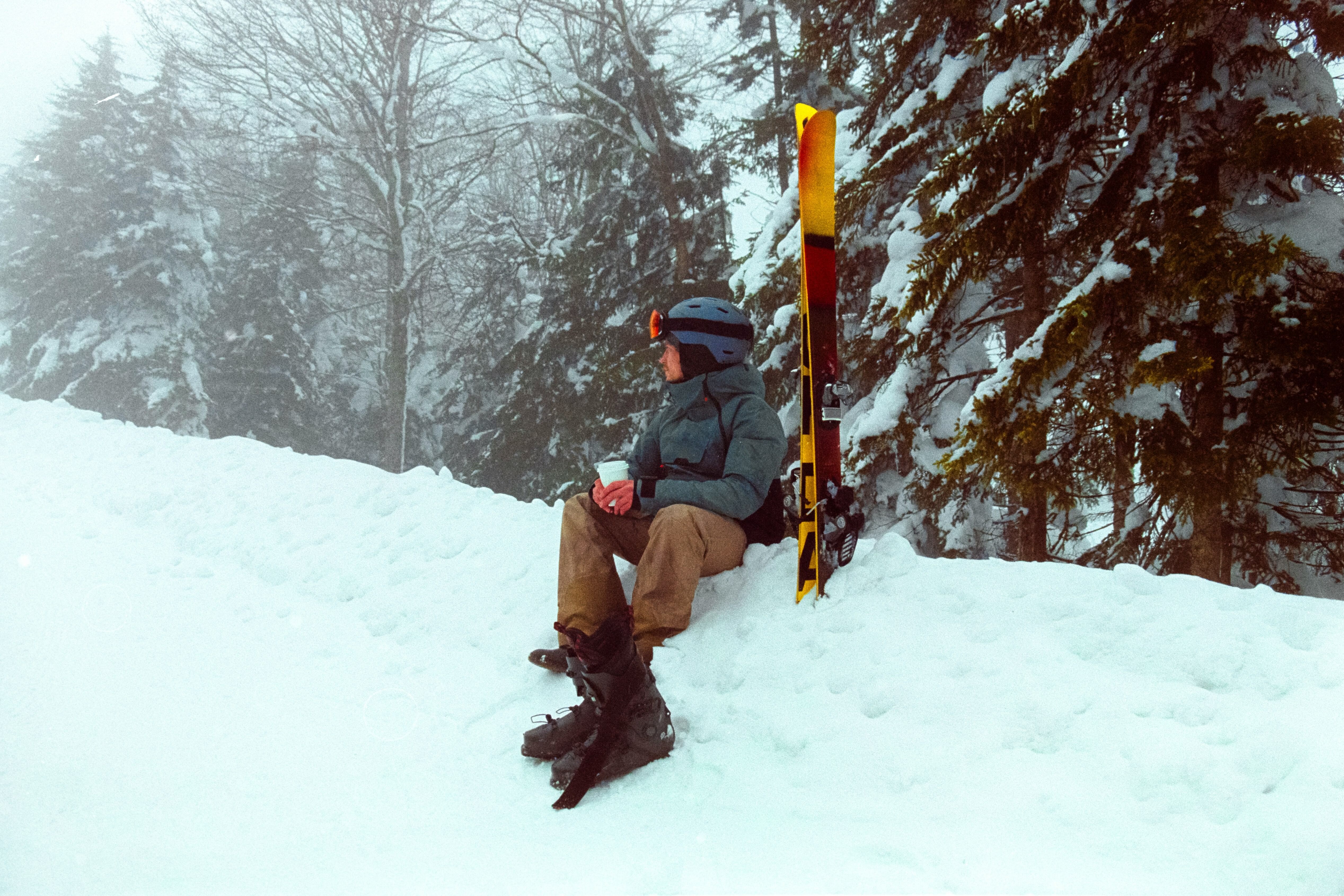 Man with ski trip equipment