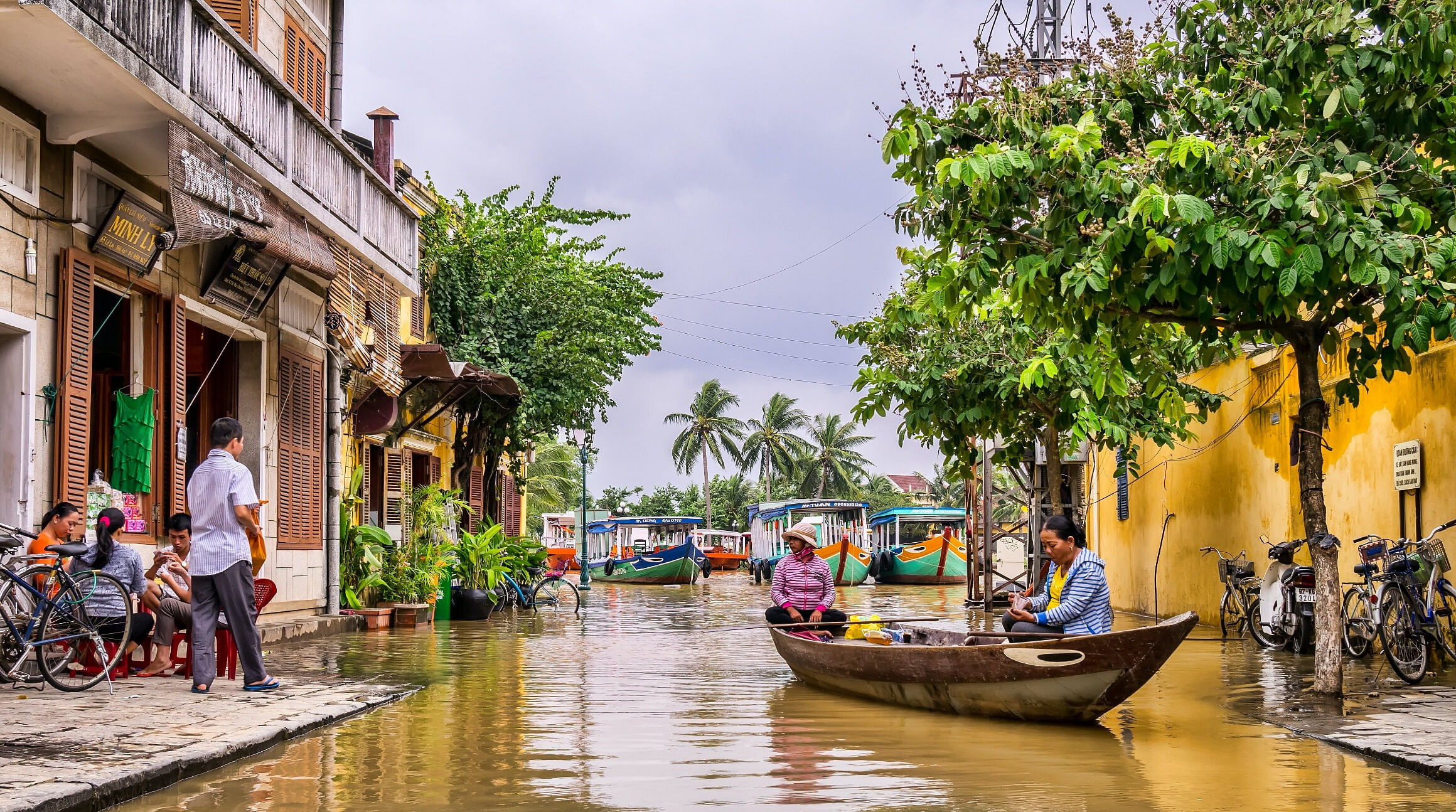 Canal and yellow houses in Hoi An, Vietnam
