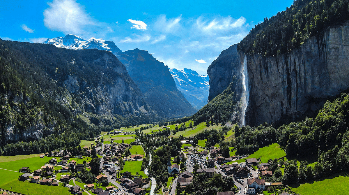 Town, mountains, and a waterfall in Lauterbrunnen Valley, Switzerland