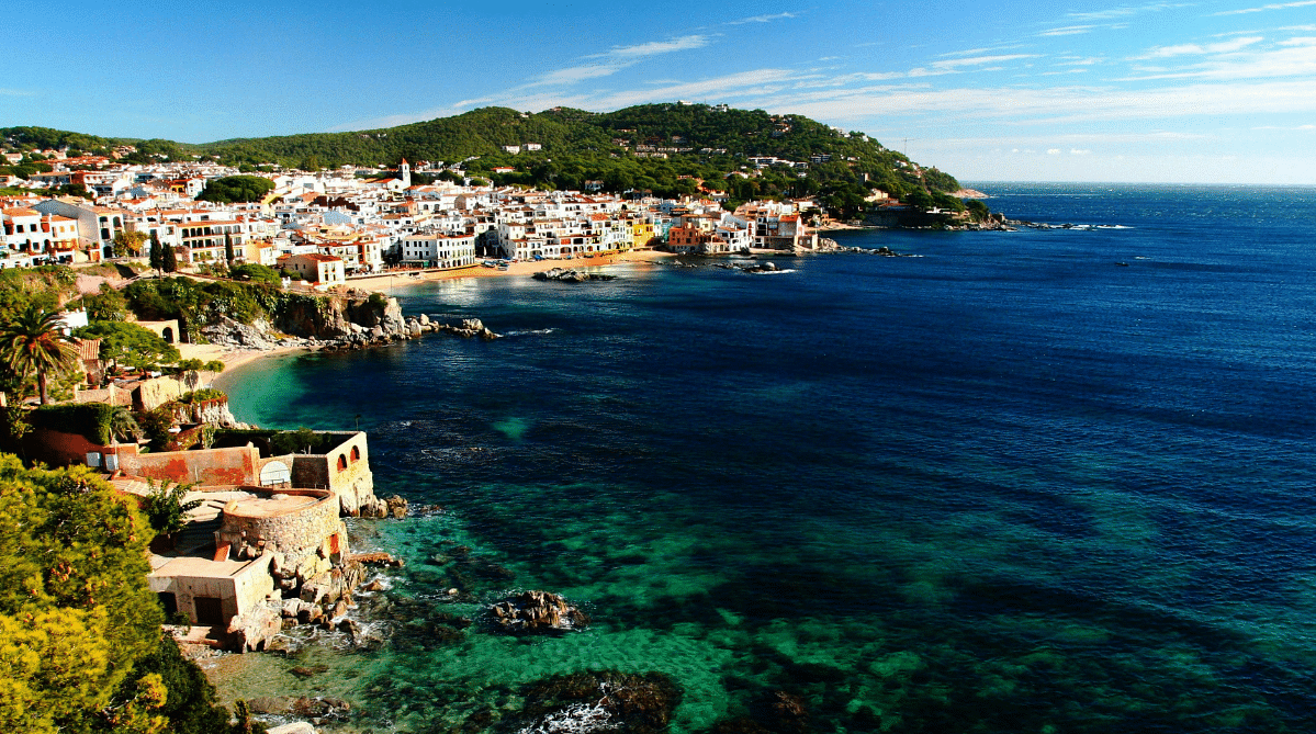 Aerial view of a town and cove in Costa Brava, Spain