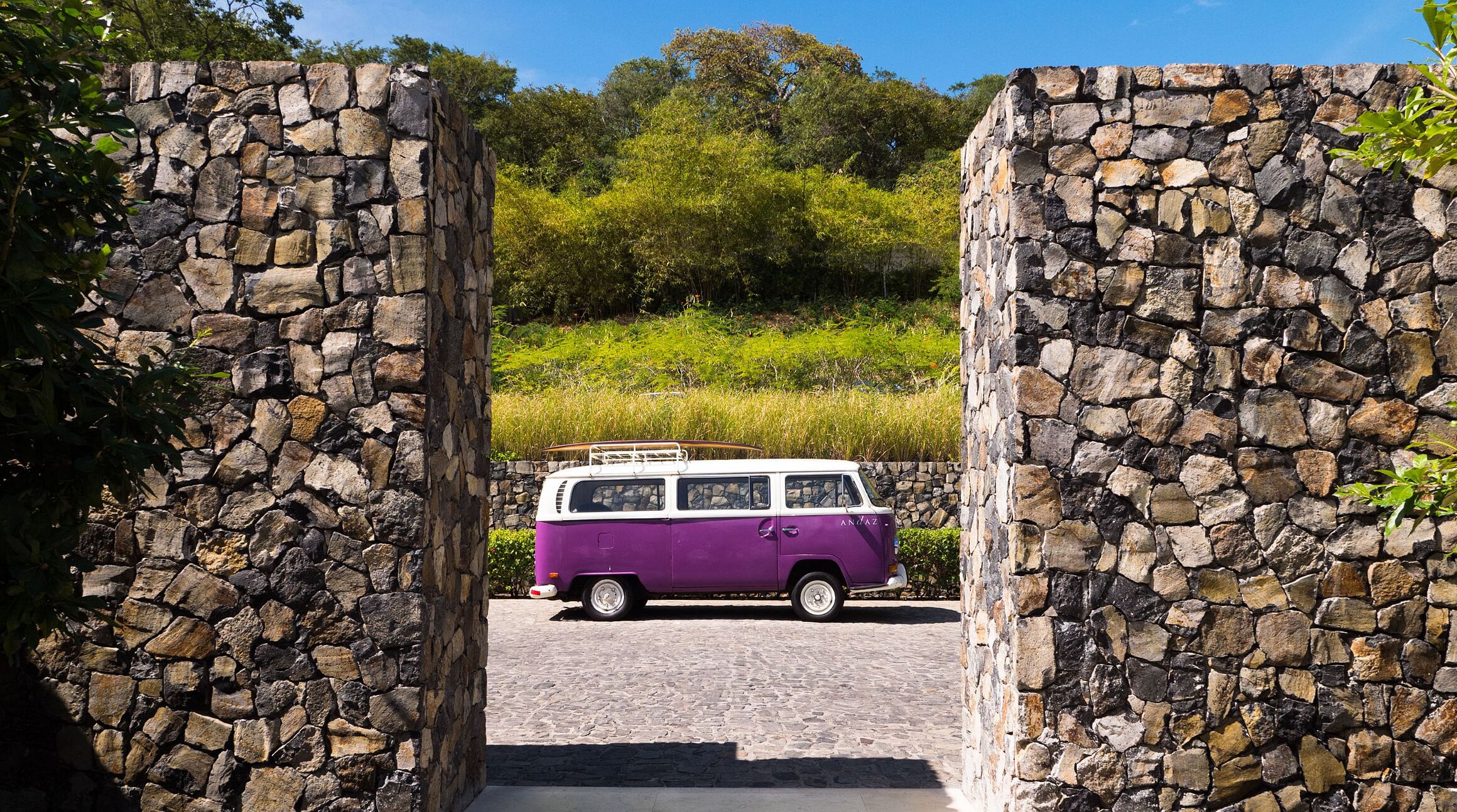 VW bus with surf boards on top in Costa Rica