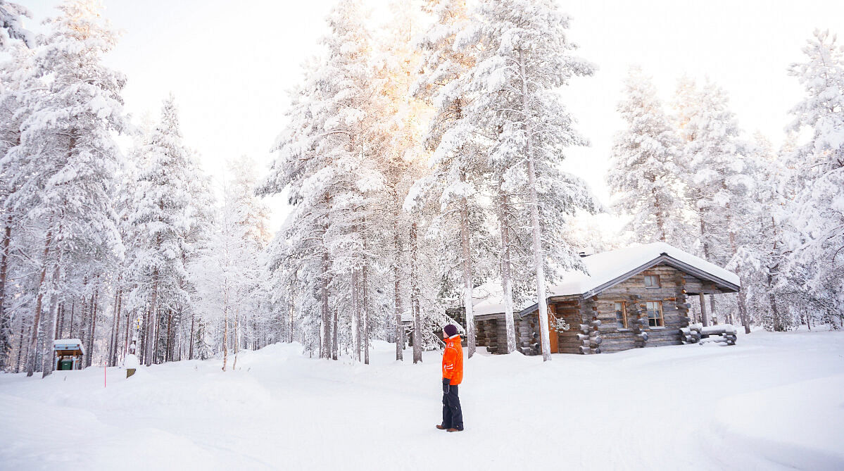 Lapland, Finland cabin and traveler