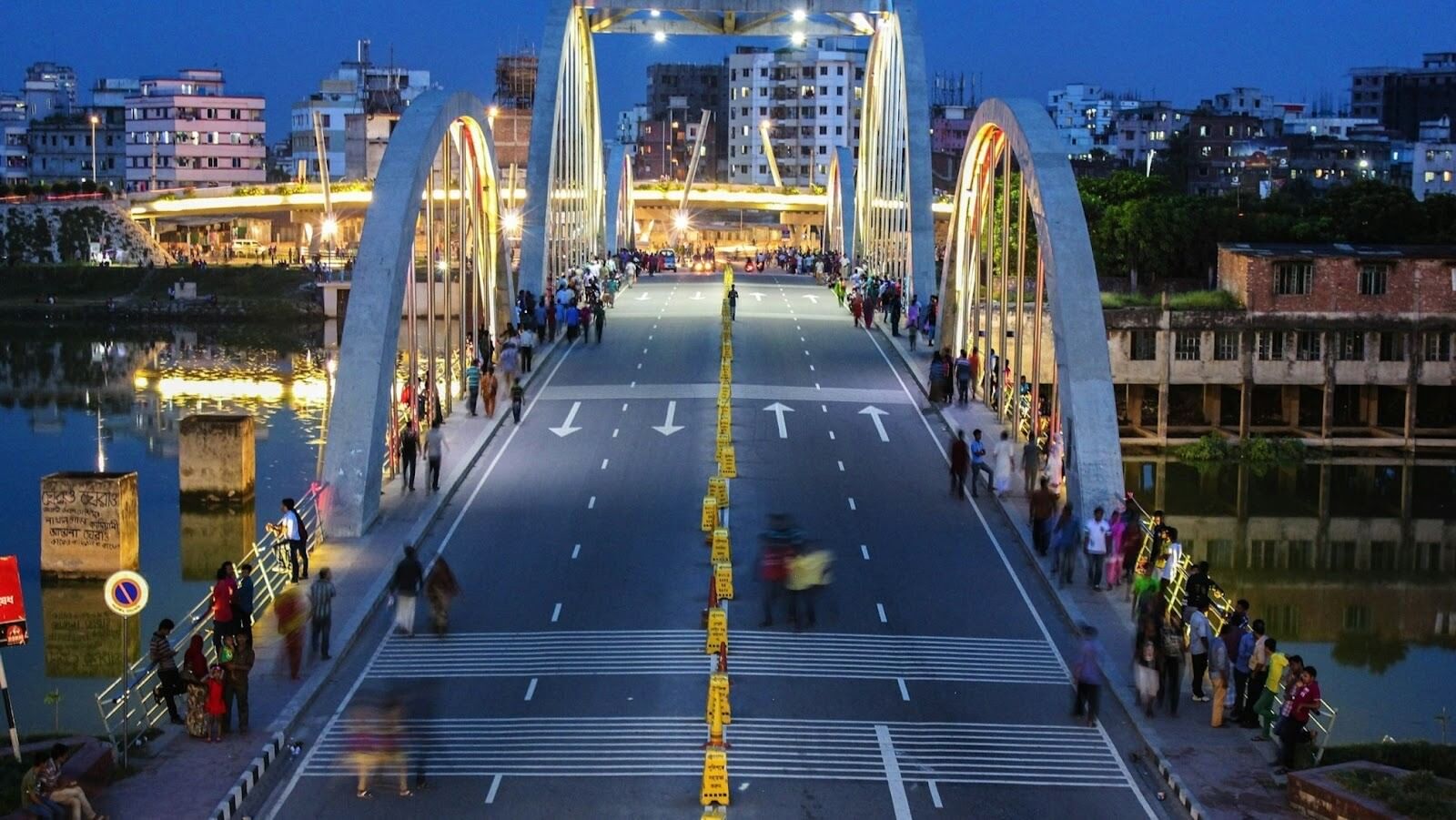 Aerial view of Hatirjheel Lake Bridge, Dhaka, Bangladesh with people walking on the pedestrian lane