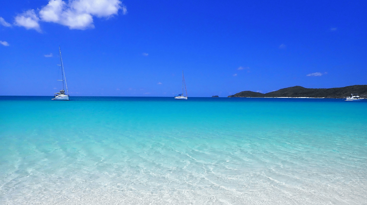 Whitehaven Beach with sailboats in the distance