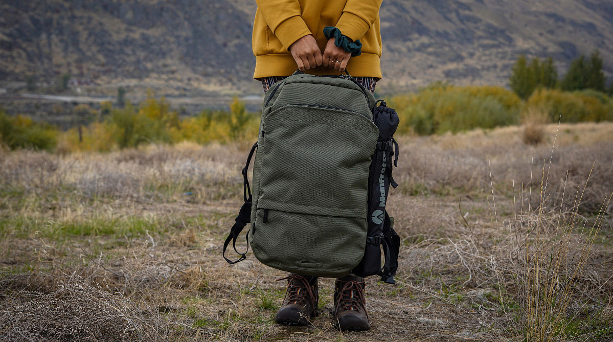 traveler holding a backpack