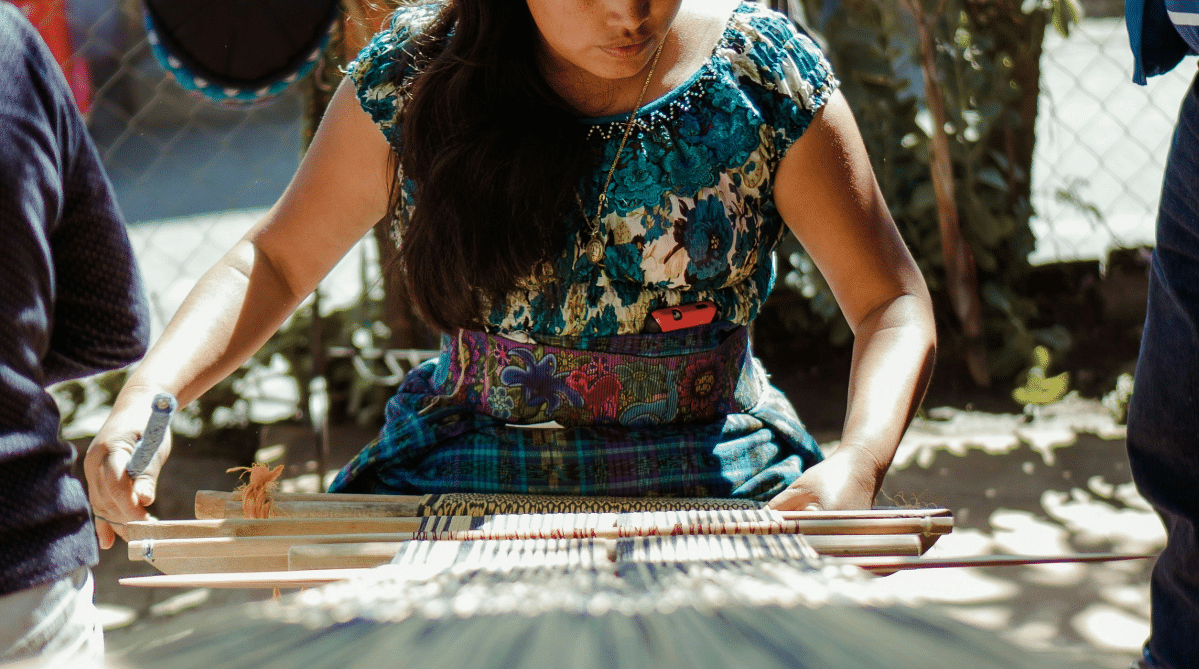 Guatemalan woman weaving textiles.