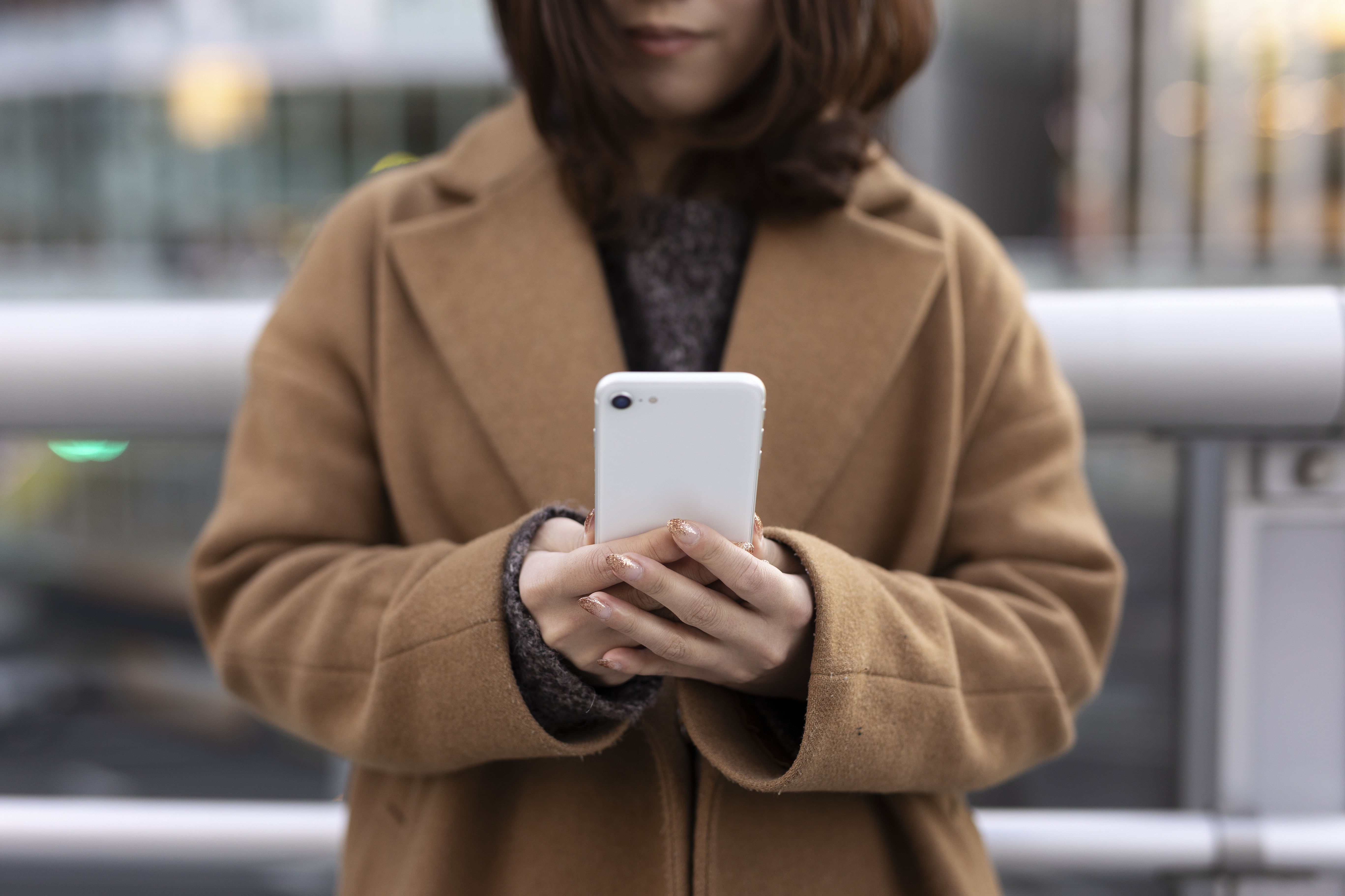 Woman using an iPhone