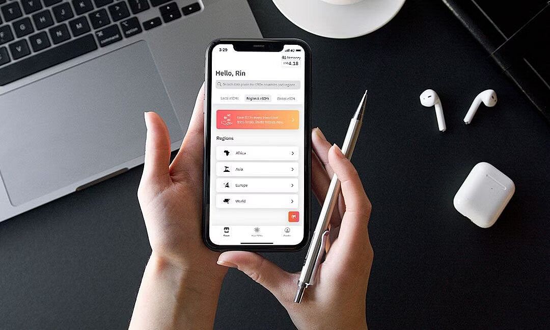 Person using Airalo eSIM on a smartphone