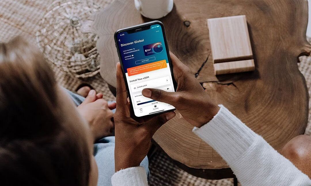 woman browsing airalo esim app